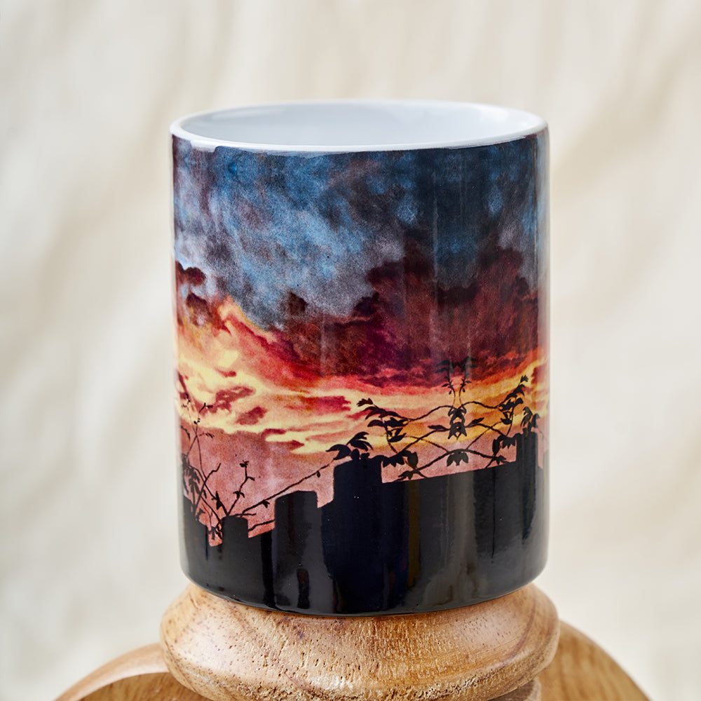 Sunset over a castle mug