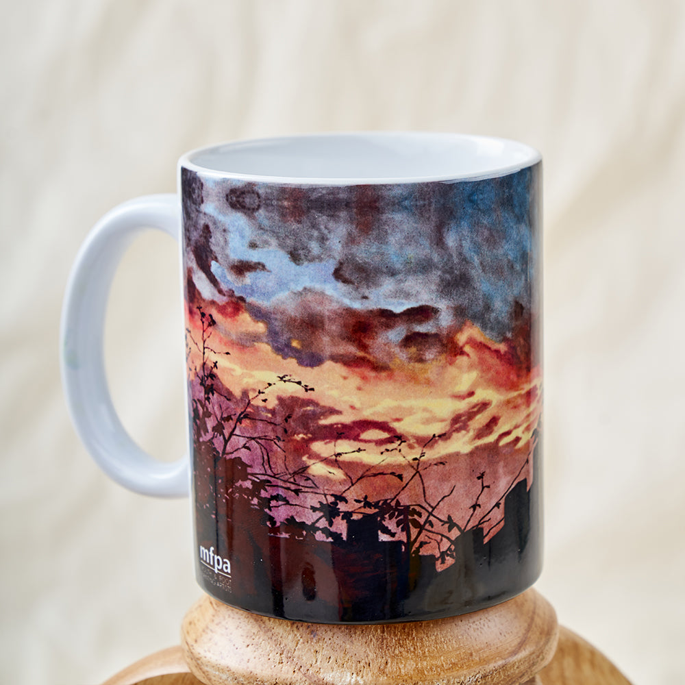 Sunset over a castle mug